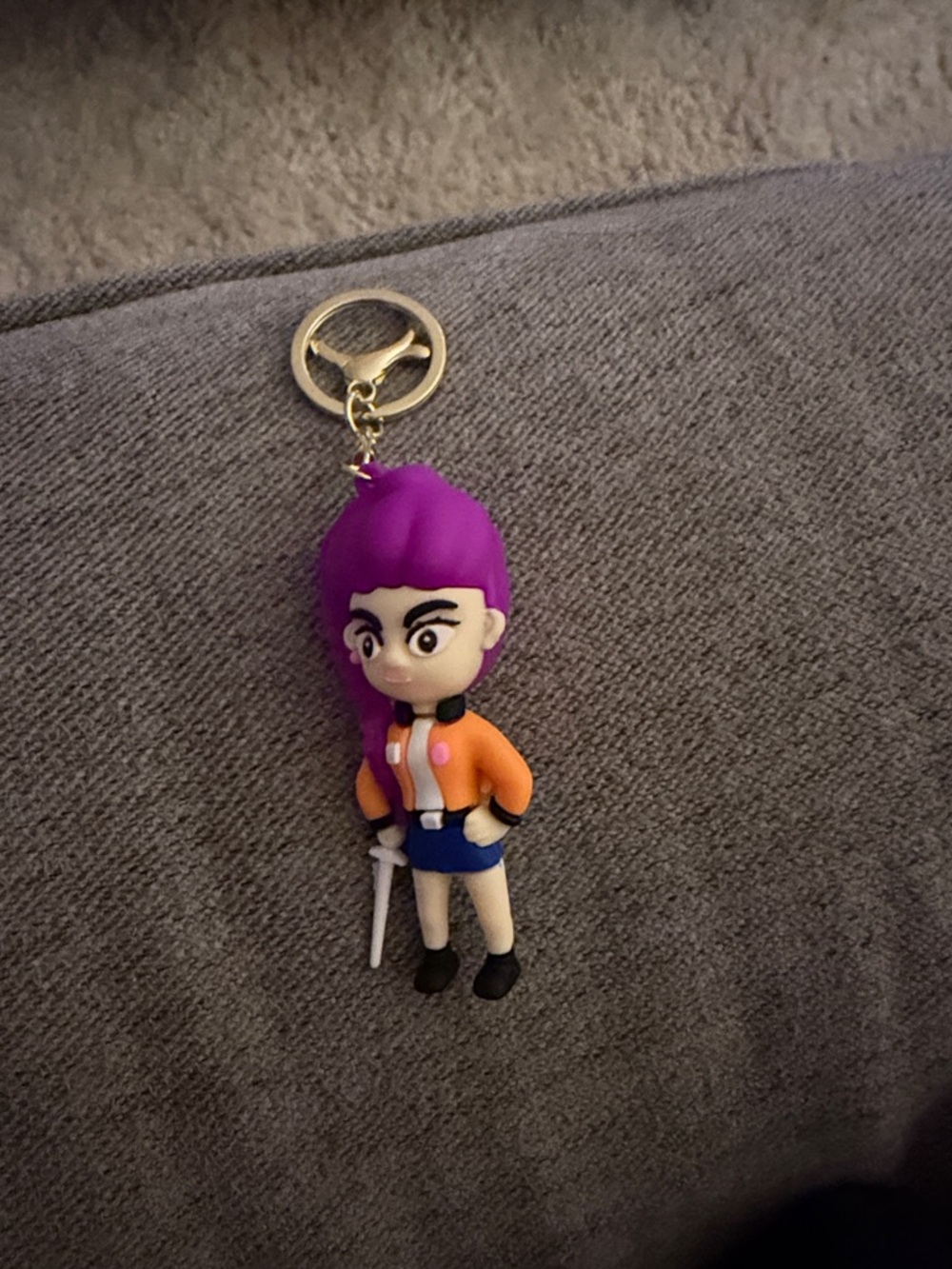 Kids Purple-Haired Character Keychain with Orange Jacket